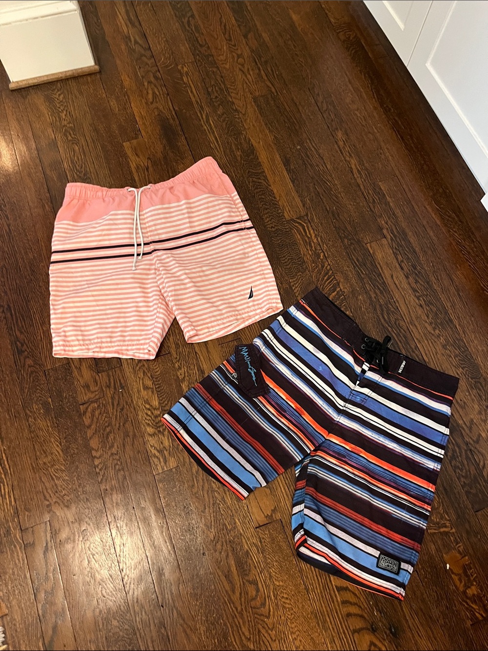 Two pair of swim trunks men’s size medium to large